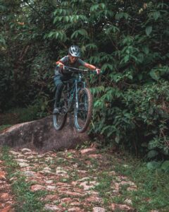 Image of mountain biker jumping